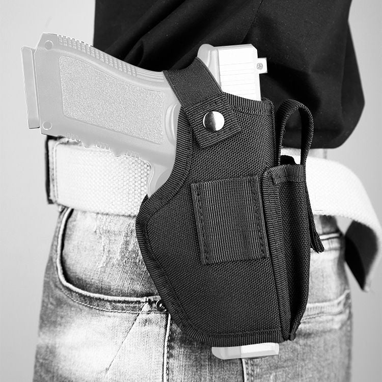 
                  
                    Ultra-Light Concealed Carry Holster with handgun, adjustable strap and mag pouch
                  
                