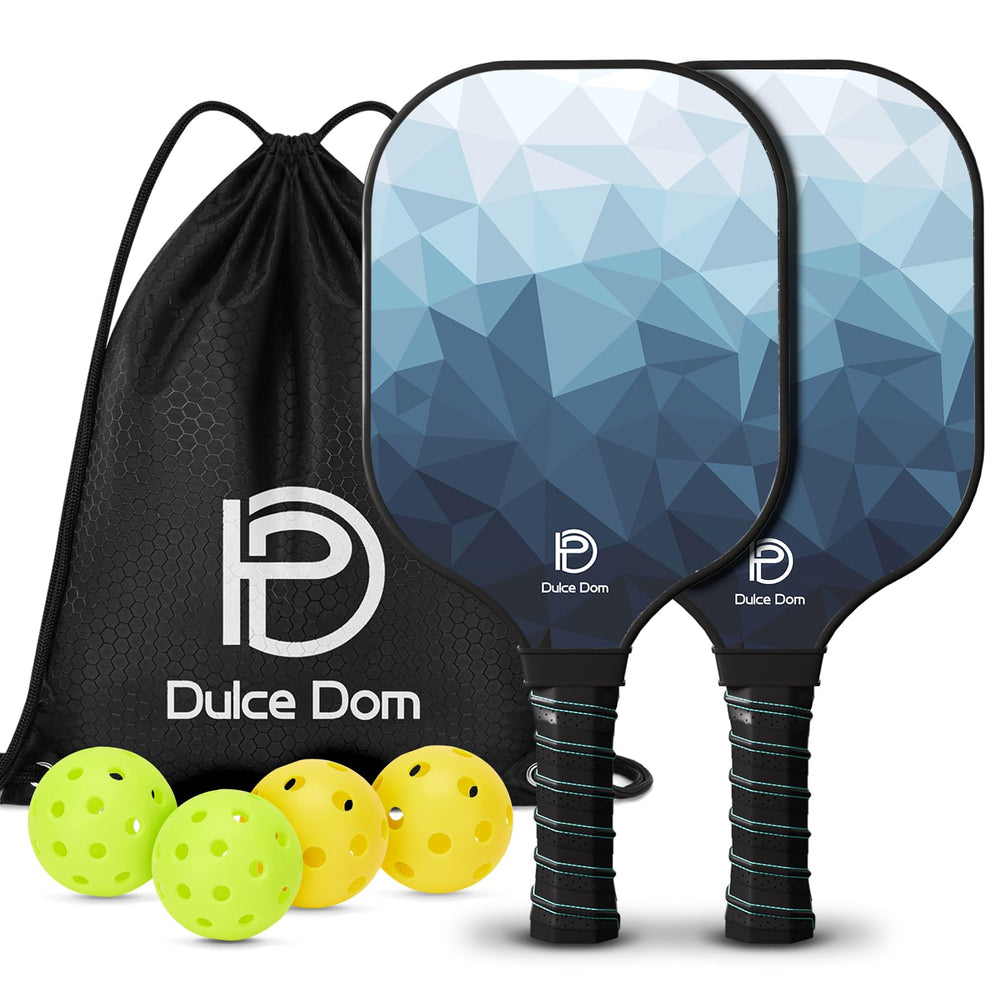 
                  
                    DULCE DOM pickleball paddle set with two paddles, four yellow balls, and a carrying bag.
                  
                